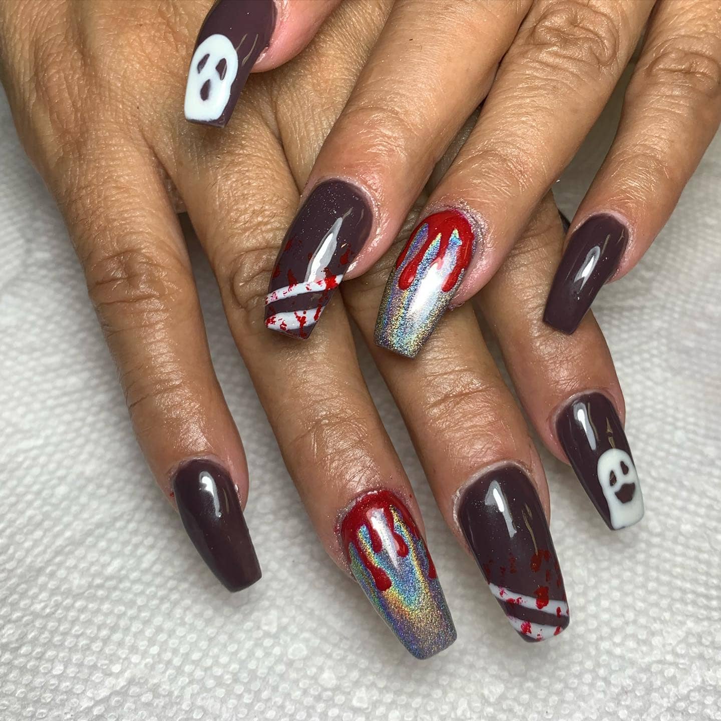 Brown manicured nails