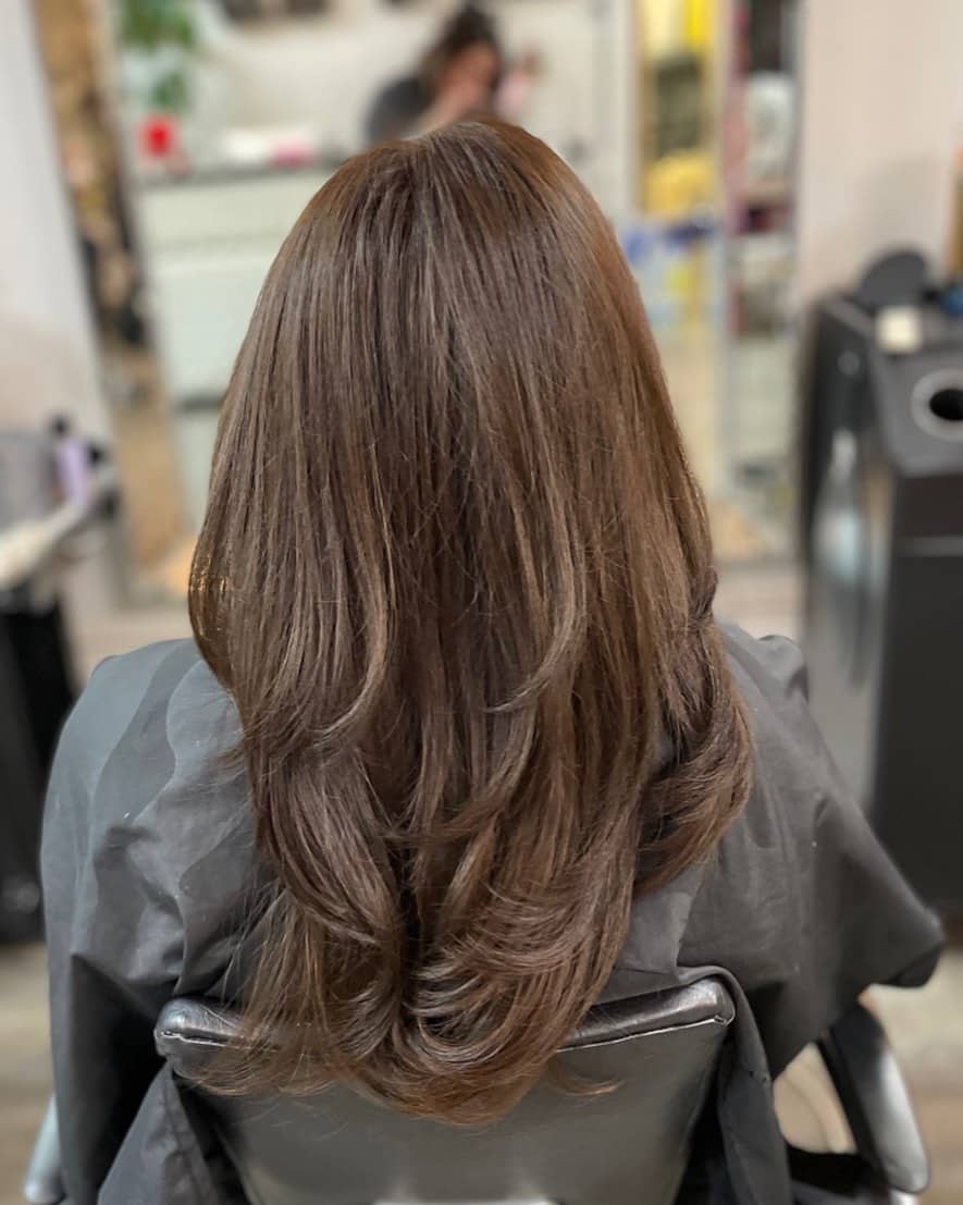 Chocolate brown hair with flowy layers