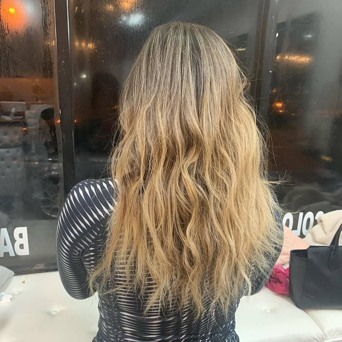 Wavy blonde hair with loose waves